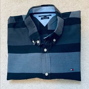 Black and grey striped long sleeve. Fairly worn. Still in perfect condition